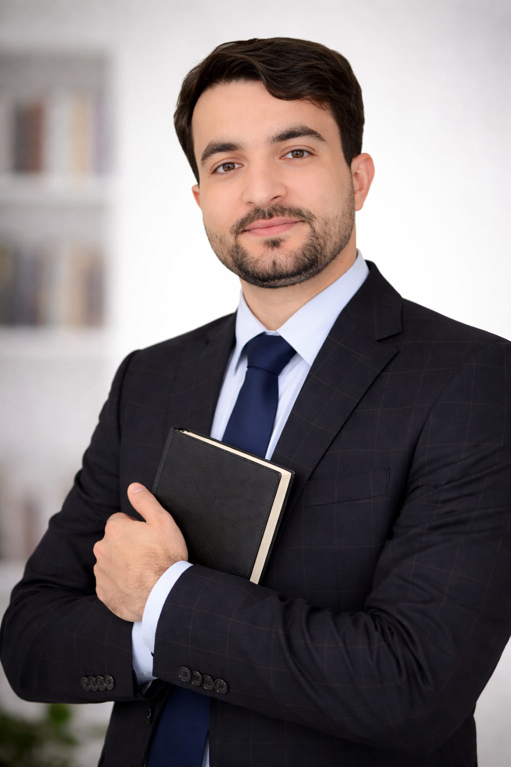 Confident author with a notebook Formal